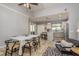 Spacious kitchen and dining area with stainless appliances and ample counter space at 1810 Winsloe Dr, Trinity, FL 34655