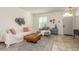 Inviting living room featuring tiled floors, comfortable seating, and abundant natural light at 1810 Winsloe Dr, Trinity, FL 34655