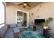 Enjoy outdoor living on this cozy screened patio with seating and entertainment area at 1810 Winsloe Dr, Trinity, FL 34655