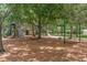 Community playground featuring swings, slides, and climbing wall for active outdoor enjoyment at 1810 Winsloe Dr, Trinity, FL 34655