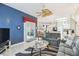 Inviting living room with view to dining area and kitchen at 18532 Myrtlewood Dr, Hudson, FL 34667