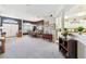 Spacious living area connects dining and kitchen spaces for easy entertainment at 18532 Myrtlewood Dr, Hudson, FL 34667