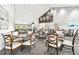 Spacious meeting room featuring large tables, comfortable chairs, and a modern design, perfect for collaboration at 18532 Myrtlewood Dr, Hudson, FL 34667