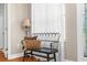 Comfortable sitting bench nook with natural light from the window at 18620 Gracie Lee St, Spring Hill, FL 34610