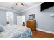 Inviting main bedroom showcasing wood floors and a traditional dresser at 18620 Gracie Lee St, Spring Hill, FL 34610