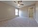 Bedroom with a ceiling fan and natural light at 19855 Ellendale Dr, Land O Lakes, FL 34638