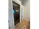 Glass enclosed shower featuring recessed lighting, tile surround, and shower head at 210 S Hale Ave, Tampa, FL 33609