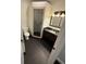Bathroom with sleek, dark marble countertop, a modern vanity, and a glass-enclosed shower stall at 210 S Hale Ave, Tampa, FL 33609