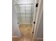 Walk-in closet with wire shelving and tile flooring at 210 S Hale Ave, Tampa, FL 33609