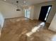 Tile flooring, shuttered windows and modern lighting fill this dining room at 210 S Hale Ave, Tampa, FL 33609
