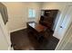 Office featuring dark wood floors, built-in shelves, and a window to let in natural light at 210 S Hale Ave, Tampa, FL 33609