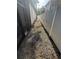 A rock-covered side yard at 210 S Hale Ave, Tampa, FL 33609