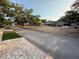 Picturesque street view featuring tree-lined sidewalks and manicured lawns in a desirable neighborhood at 210 S Hale Ave, Tampa, FL 33609