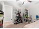 Well-organized bedroom with decorative shelves, playful accents, and comfortable furnishings at 2132 Shining Azul Way, Lutz, FL 33558