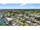 An aerial view showcases the property's neighborhood and access to the ocean at 2175 Edythe Dr, Dunedin, FL 34698