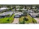 Aerial view of the home and neighborhood, showcasing its prime location and curb appeal at 2175 Edythe Dr, Dunedin, FL 34698