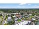 An aerial view highlights the property's convenient access to local services, schools, and community parks at 2175 Edythe Dr, Dunedin, FL 34698