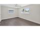 Bright and airy bedroom with many windows offering a beautiful view at 2175 Edythe Dr, Dunedin, FL 34698