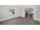 Open-concept living room with modern finishes and plenty of natural light at 2175 Edythe Dr, Dunedin, FL 34698
