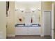 Bathroom with double sinks and vanity at 3431 Riderwood Dr, Dade City, FL 33523