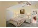 Comfortable bedroom features spacious closet, bedside tables, and ceiling fan at 3431 Riderwood Dr, Dade City, FL 33523