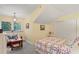 Bright bedroom features large window with natural light and sitting area at 3431 Riderwood Dr, Dade City, FL 33523