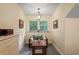 Cozy sitting area with cushioned bench and coffee table at 3431 Riderwood Dr, Dade City, FL 33523