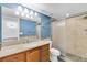 Updated bathroom features a modern vanity and glass enclosed shower at 3819 Teeside Dr, New Port Richey, FL 34655