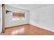 Bedroom featuring hardwood flooring, a window with coverings and natural light at 3819 Teeside Dr, New Port Richey, FL 34655