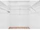 A walk-in closet features wire racks for storage at 3819 Teeside Dr, New Port Richey, FL 34655