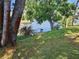 Scenic backyard featuring waterfront access and lush greenery at 4264 Tamargo Dr # 3, New Port Richey, FL 34652