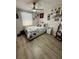 Comfortable bedroom with a ceiling fan, a white bed, and a light-filled window at 4264 Tamargo Dr # 3, New Port Richey, FL 34652