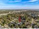 Picturesque aerial view featuring surrounding lush greenery, waterways, and community layout at 4934 Amherst Ct, New Port Richey, FL 34652