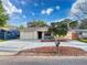 Charming single-story home featuring a well-manicured front yard and inviting curb appeal at 4934 Amherst Ct, New Port Richey, FL 34652