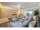 Beautiful and roomy living room featuring an open floorplan, modern decor, and plenty of natural light at 4934 Amherst Ct, New Port Richey, FL 34652
