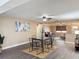 Inviting dining area with modern table set, flowing into a living space with lots of natural light at 4934 Amherst Ct, New Port Richey, FL 34652