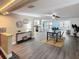 Bright, open-concept floor plan integrates the living and dining areas for seamless entertaining and living at 4934 Amherst Ct, New Port Richey, FL 34652