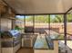 Modern outdoor kitchen with grill, counter space, sink, and stainless steel storage at 4934 Amherst Ct, New Port Richey, FL 34652