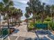 Robert K. Rees Memorial Park entrance lined with palm trees, playground, and serene beach access at 4934 Amherst Ct, New Port Richey, FL 34652