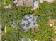 Overhead aerial view of a home showcasing the pool and solar panels at 520 Lafayette Blvd, Oldsmar, FL 34677
