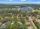 Expansive aerial view of the neighborhood featuring multiple ponds and lush greenery at 520 Lafayette Blvd, Oldsmar, FL 34677