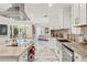 Spacious kitchen with white cabinets, stainless appliances, and easy access to the dining and living spaces at 520 Lafayette Blvd, Oldsmar, FL 34677