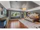 Spacious main bedroom with hardwood floors, large windows and elegant decor at 520 Lafayette Blvd, Oldsmar, FL 34677