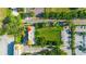 Multi-Gathering unit is located on a quiet street with sidewalks and nearby green space at 658 Siren Wind Ln, Clearwater, FL 33756