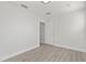 Minimalist bedroom design with light, modern flooring and ample natural light at 658 Siren Wind Ln, Clearwater, FL 33756