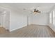 Generously sized bedroom featuring contemporary flooring and an airy ambiance at 658 Siren Wind Ln, Clearwater, FL 33756