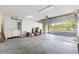 A spacious garage offers ample storage and parking space at 658 Siren Wind Ln, Clearwater, FL 33756