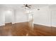 Bright living room with hardwood floors, a ceiling fan, and neutral paint at 658 Siren Wind Ln, Clearwater, FL 33756