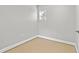 Small empty room featuring a window and neutral color scheme at 658 Siren Wind Ln, Clearwater, FL 33756