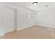 Bright, tiled room with a white door and two windows at 658 Siren Wind Ln, Clearwater, FL 33756